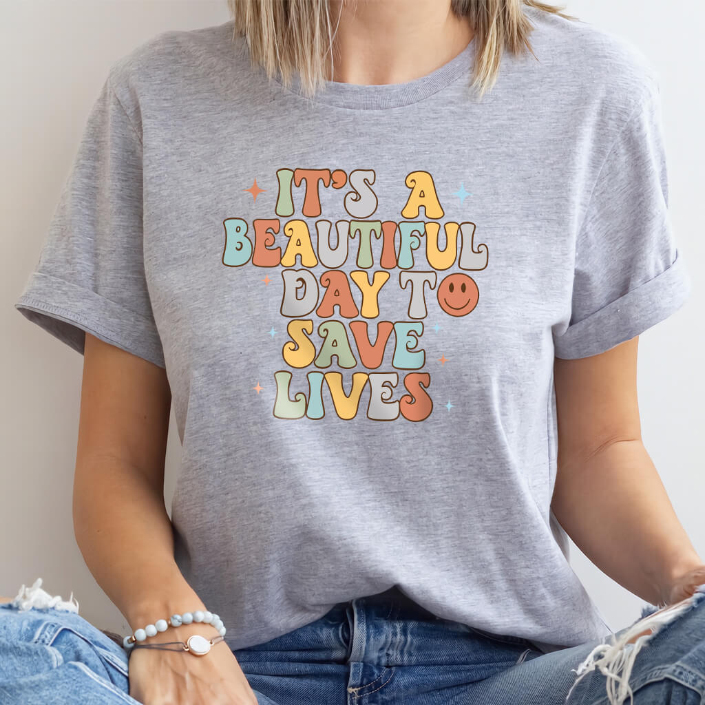 It's a Beautiful Day to Save Lives - Funny Groovy Nurse T-shirt